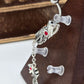 Painful Pleasures Dragon Dangle Navel Ring in 14G Surgical Steel with Red Gems