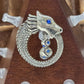 Painful Pleasures Dragon Ouroboros Navel Ring in 14G Surgical Steel with Blue Gems