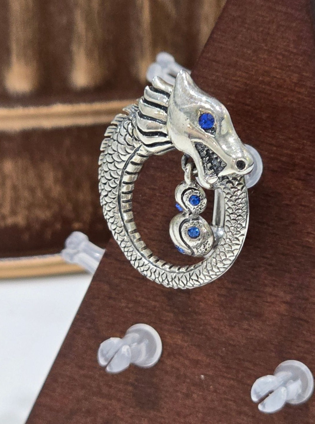 Painful Pleasures Dragon Ouroboros Navel Ring in 14G Surgical Steel with Blue Gems
