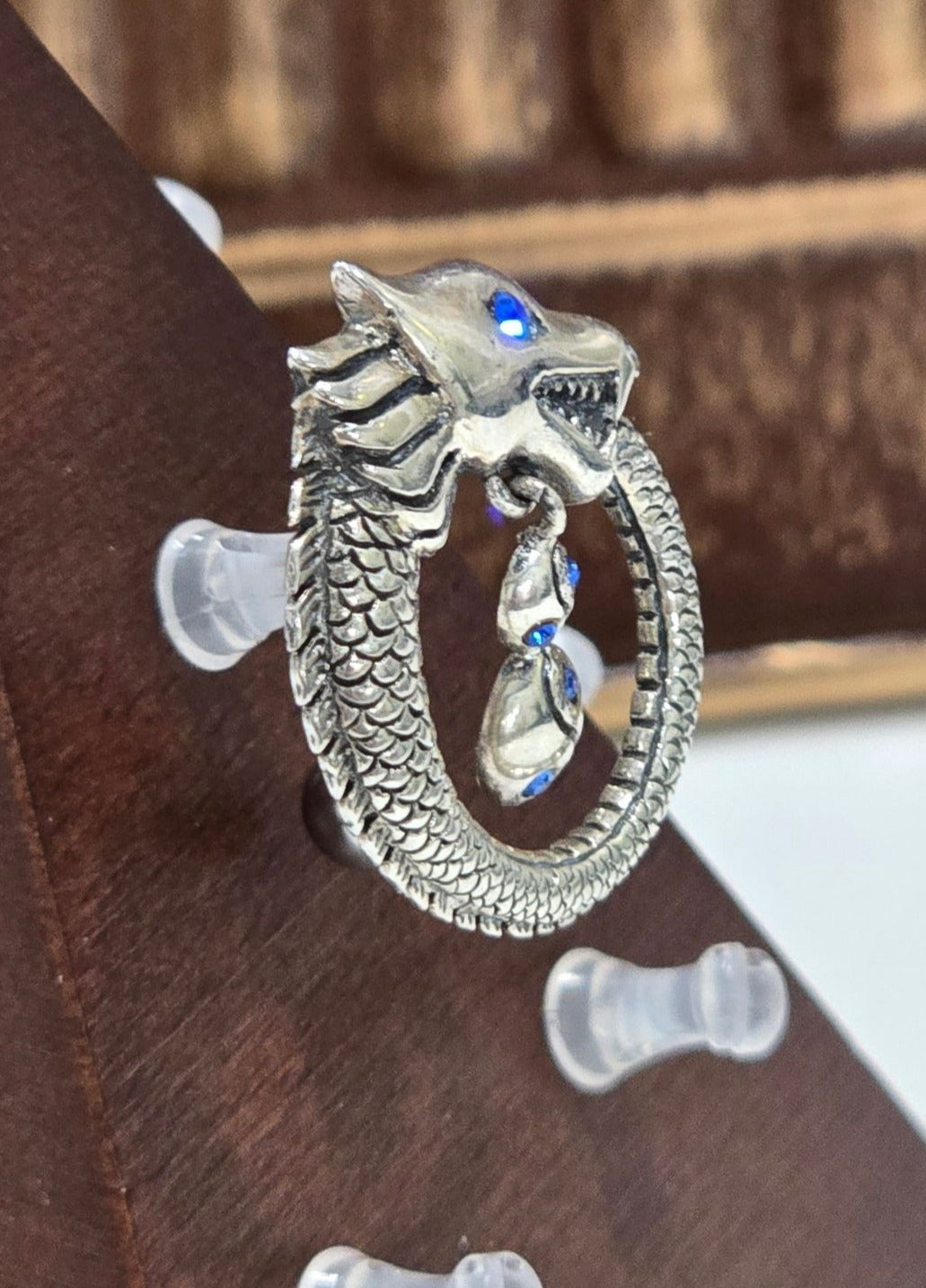 Painful Pleasures Dragon Ouroboros Navel Ring in 14G Surgical Steel with Blue Gems