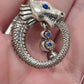 Painful Pleasures Dragon Ouroboros Navel Ring in 14G Surgical Steel with Blue Gems