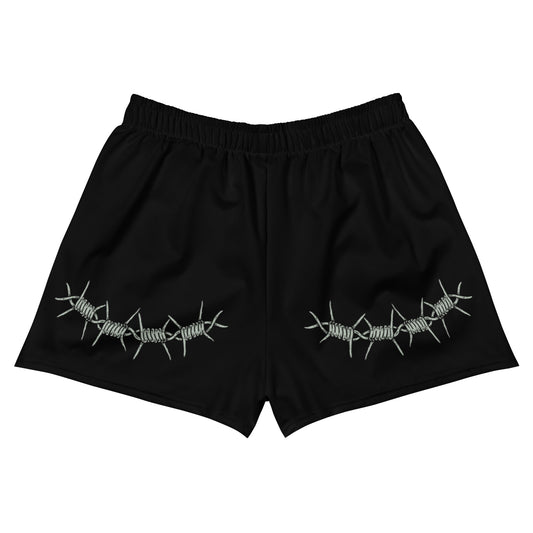 Black shorts with barbed wire design on a white background