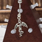Painful Pleasures Dragon & Skull Navel Ring in 14G Surgical Steel with Gem Accent