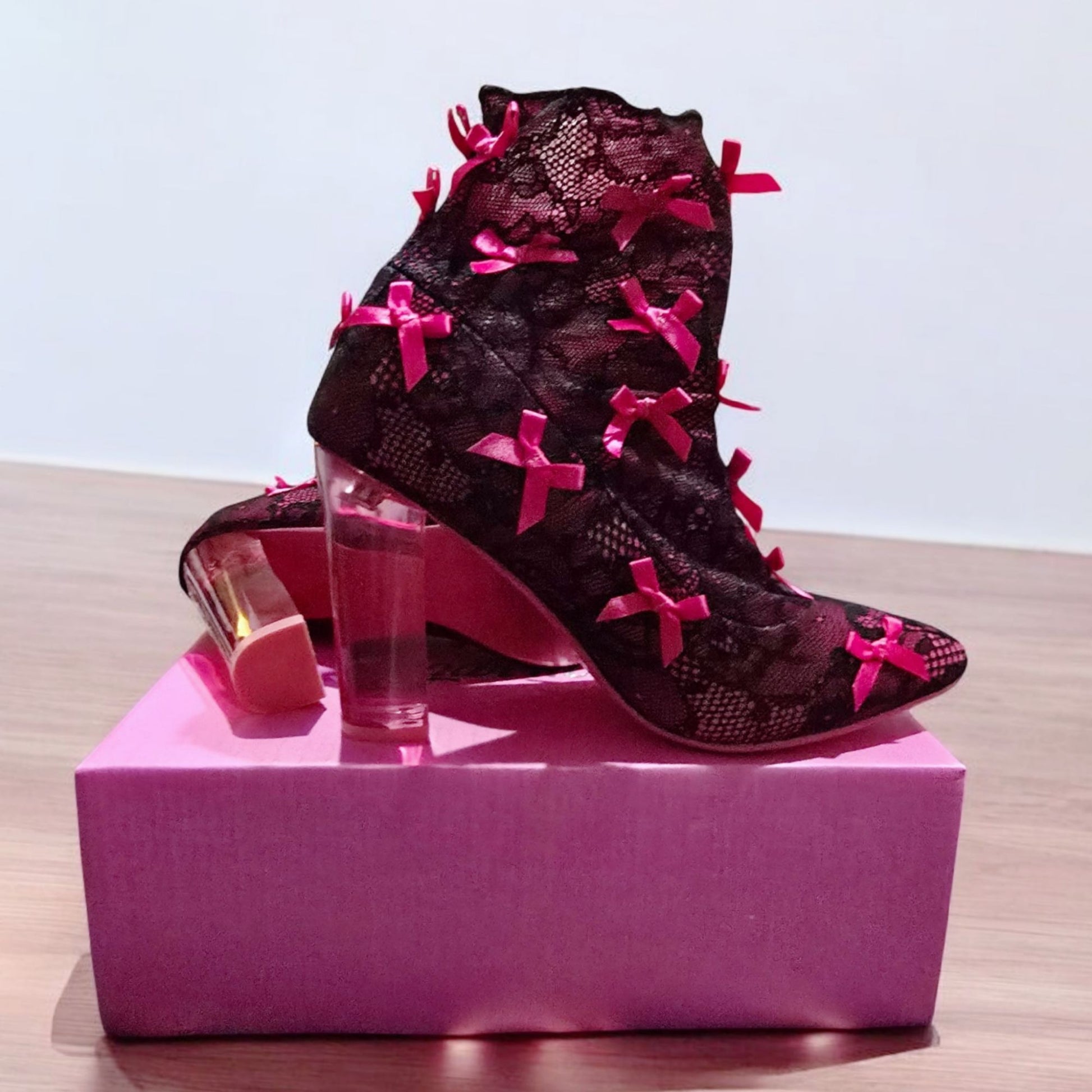 Rubina Portrait Mode Booties W/ Transparent Heel & Bow Accents -  - Shoes