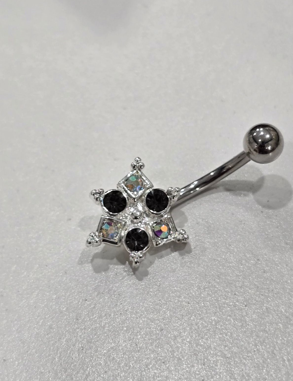 Painful Pleasures Black & Iridescent Gem Star Navel Ring in 14G Surgical Steel