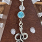 Painful Pleasures Blue Gem Snake Charm Navel Ring in 14G Surgical Steel